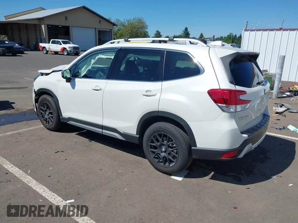2022 Subaru Forester Touring with VIN JF2SKARC9NH445126, listed as a IAAI auction lot 42350111 with 61,998 mi miles and . Bid and sale history available at DreamBid. Image 3.