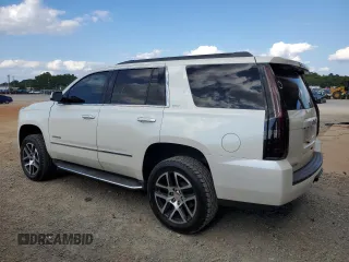 2015 GMC Yukon SLT with VIN 1GKS2BKC1FR736203, listed as a Copart auction lot 67977694 with 178,781 mi miles and Salvage Title. Bid and sale history available at carsss.com. Image 2.