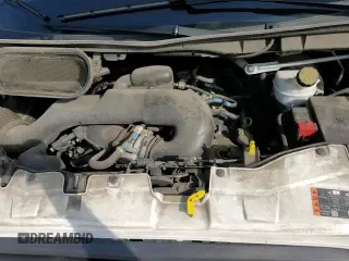2017 Ford Transit z VIN 1FTYR1ZM3HKA39329, wystawiony jako Copart lot #56857545 z przebiegiem 58 967 mil mil oraz Szkoda całkowita • Salvage title. Historia ofert i sprzedaży dostępna na DreamBid. Obrazek 14.