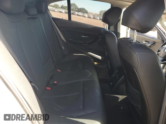 2018 BMW 3 Series 320i with VIN WBA8A9C5XJAH13799, listed as a Copart auction lot 53917375 with 104,635 mi miles and Salvage Title. Bid and sale history available at carsss.com. Image 10.