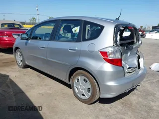 2013 Honda Fit with VIN JHMGE8H31DC042192, listed as a IAAI auction lot 42036582 with 63,223 mi miles. Bid and sale history available at carsss.com. Image 3.