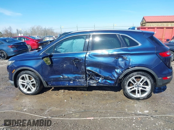 2015 Lincoln MKC with VIN 5LMTJ2AH2FUJ12531, listed as a IAAI auction lot 41639903 with 112,835 mi miles. Bid and sale history available at carsss.com. Image 14.