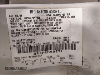2005 Ford Focus S with VIN 1FAFP34N65W265707, listed as a IAAI auction lot 42169166 with 145,254 mi miles and . Bid and sale history available at carsss.com. Image 9.