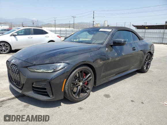 2022 BMW 4 Series M440i with VIN WBA53AT01NCJ52404, listed as a Copart auction lot 54464474 with 16,880 mi miles and Salvage title. Bid and sale history available at DreamBid. Image 1.