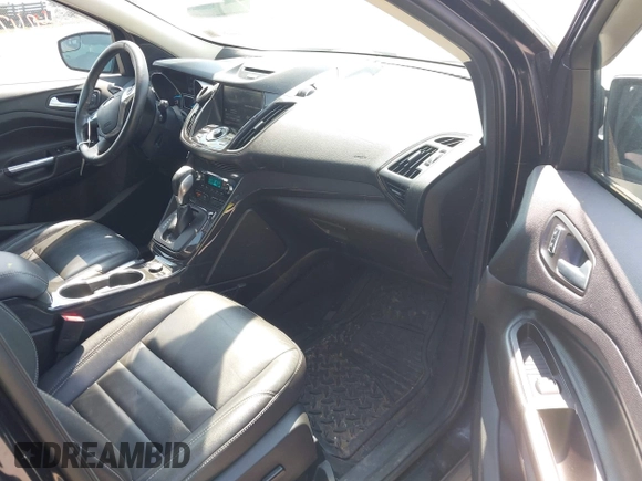 2015 Ford Escape Titanium with VIN 1FMCU9J96FUB58519, listed as a IAAI auction lot 42429369 with 125,541 mi miles and . Bid and sale history available at DreamBid. Image 5.