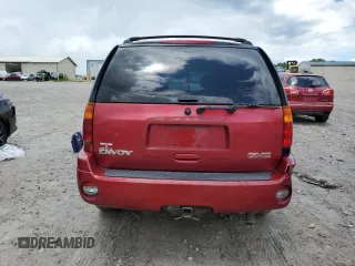 2005 GMC Envoy SLE z VIN 1GKDT13S752203494, wystawiony jako Copart lot #56150605 z przebiegiem 243 475 mil mil oraz Szkody całkowita. Historia ofert i sprzedaży dostępna na DreamBid. Obrazek 6.