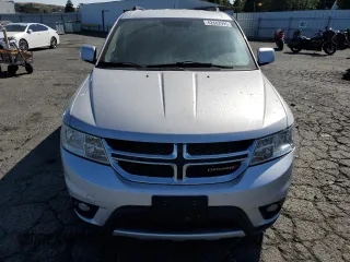 2012 Dodge Journey SXT z VIN 3C4PDDBG0CT293331, wystawiony jako Copart lot #62602995 z przebiegiem 185 605 mil mil oraz Szkoda całkowita • Salvage title. Historia ofert i sprzedaży dostępna na DreamBid. Obrazek 5.