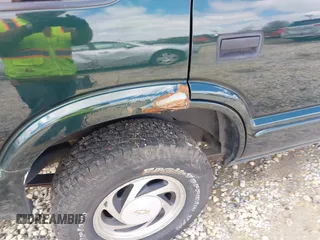 2003 Chevrolet Blazer LS z VIN 1GNDT13X93K177170, wystawiony jako IAAI lot #41839837 z przebiegiem 148 555 mil mil oraz . Historia ofert i sprzedaży dostępna na DreamBid. Obrazek 17.