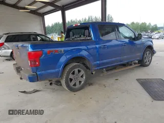 2018 Ford F-150 XL with VIN 1FTEW1EG5JFC68007, listed as a IAAI auction lot 42640571 with 148,394 mi miles and . Bid and sale history available at DreamBid. Image 4.
