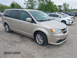 2014 Dodge Grand Caravan SXT z VIN 2C4RDGCG2ER372983, wystawiony jako IAAI lot #42369214 z przebiegiem 148 756 mil mil oraz . Historia ofert i sprzedaży dostępna na DreamBid. Obrazek 1.