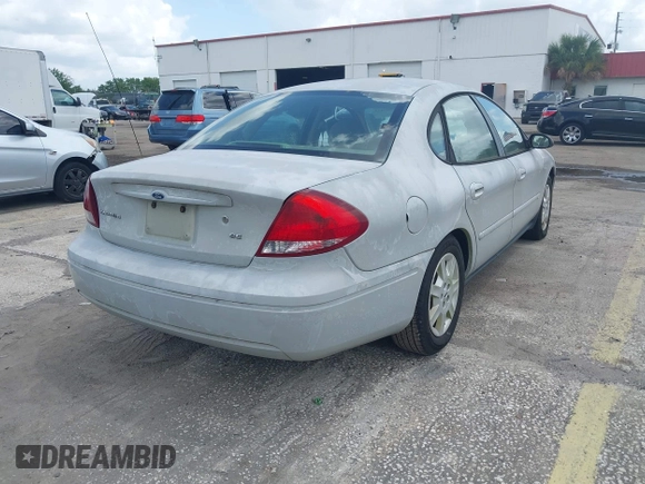 2006 Ford Taurus SE with VIN 1FAFP53U56A209213, listed as a IAAI auction lot 42009423 with 118,083 mi miles. Bid and sale history available at carsss.com. Image 4.