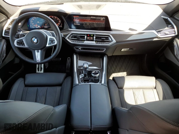 2023 BMW X6 M50i with VIN 5UXCY8C09P9P28422, listed as a Copart auction lot 52818133 with 4,131 mi miles and Salvage Title. Bid and sale history available at carsss.com. Image 8.