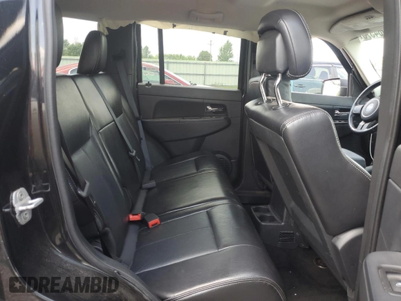 2012 Jeep Liberty Sport with VIN 1C4PJMAK9CW182088, listed as a Copart auction lot 61964575 with 107,911 mi miles and Salvage title. Bid and sale history available at DreamBid. Image 11.