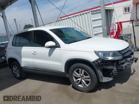 2014 Volkswagen Tiguan SEL with VIN WVGAV3AX0EW524669, listed as a IAAI auction lot 42289003 with 94,513 mi miles and . Bid and sale history available at DreamBid. Image 14.