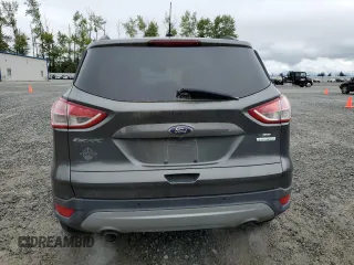 2016 Ford Escape SE z VIN 1FMCU0GX9GUC69200, wystawiony jako Copart lot #57565265 z przebiegiem 131 353 mil mil oraz Czysty tytuł • Clean title. Historia ofert i sprzedaży dostępna na DreamBid. Obrazek 6.