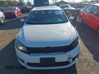 2013 Volkswagen Passat SE w/Sunroof & Nav with VIN 1VWBP7A32DC017647, listed as a IAAI auction lot 41991170 with 270,917 mi miles. Bid and sale history available at carsss.com. Image 6.