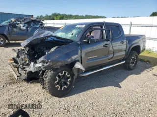 2023 Toyota Tacoma SR z VIN 3TYCZ5ANXPT156018, wystawiony jako Copart lot #52790995 z przebiegiem Nie podano mil oraz Nie do naprawy • Non repairable. Historia ofert i sprzedaży dostępna na DreamBid. Obrazek 1.