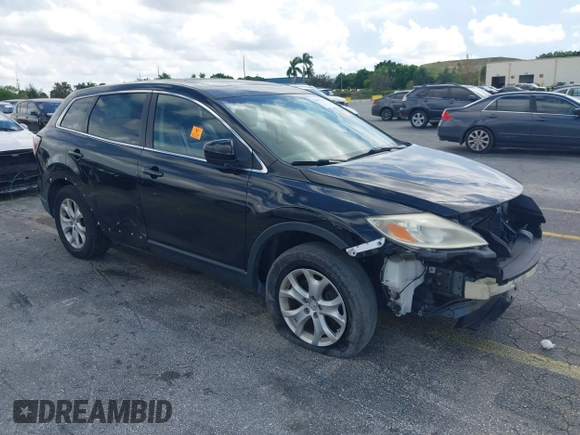 2012 Mazda CX-9 Touring with VIN JM3TB3CV1C0338681, listed as a IAAI auction lot 40458498 with 128,665 mi miles and . Bid and sale history available at DreamBid. Image 1.