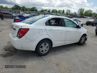 2014 Chevrolet Sonic LT with VIN 1G1JC5SH8E4242409, listed as a Copart auction lot 55356865 with 141,497 mi miles and Clean Title. Bid and sale history available at DreamBid. Image 5.