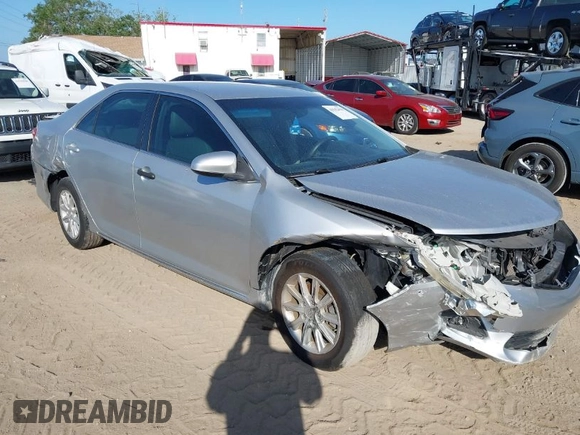 2012 Toyota Camry L with VIN 4T4BF1FKXCR216121, listed as a IAAI auction lot 41942104 with 153,448 mi miles. Bid and sale history available at carsss.com. Image 1.