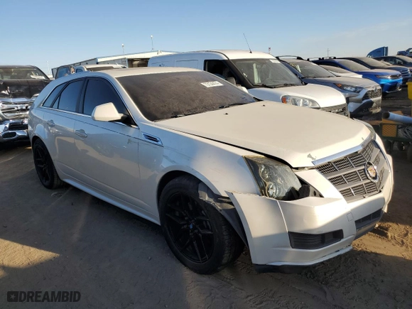 2010 Cadillac CTS Wagon Luxury with VIN 1G6DH8EG3A0117977, listed as a Copart auction lot 73134474 with NaN miles and Salvage Title. Bid and sale history available at carsss.com. Image 4.