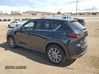 2020 Mazda CX-5 Grand Touring with VIN JM3KFBDMXL1735154, listed as a Copart auction lot 49313585 with 82,750 mi miles and Salvage Title. Bid and sale history available at DreamBid. Image 2.