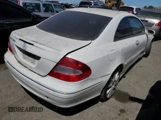 2007 Mercedes-Benz CLK 350 with VIN WDBTJ56H97F205410, listed as a Copart auction lot 57543504 with 86,283 mi miles and Salvage Title. Bid and sale history available at DreamBid. Image 3.