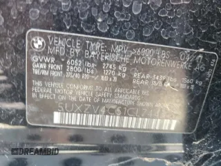 2012 BMW X5 35i z VIN 5UXZV4C51CL744313, wystawiony jako Copart lot #58270755 z przebiegiem 97 903 mil mil oraz Szkoda całkowita • Salvage title. Historia ofert i sprzedaży dostępna na DreamBid. Obrazek 12.