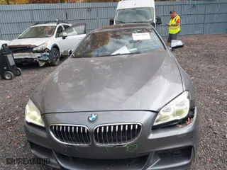 2016 BMW 6 Series 640i xDrive with VIN WBA6D2C50GGT66007, listed as a IAAI auction lot 40673899 with 73,695 mi miles. Bid and sale history available at carsss.com. Image 12.