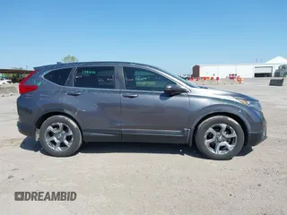 2019 Honda CR-V EX with VIN 5J6RW1H58KA042502, listed as a IAAI auction lot 42001700 with 117,396 mi miles and . Bid and sale history available at DreamBid. Image 13.