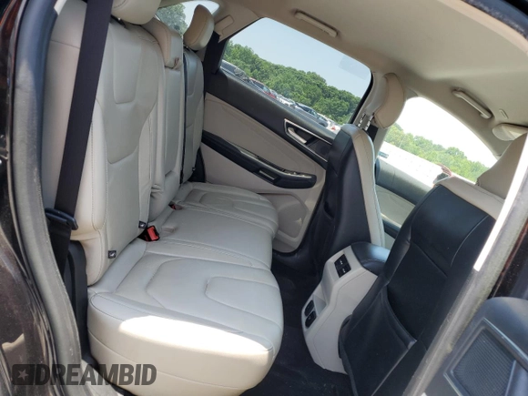 2019 Ford Edge Titanium z VIN 2FMPK3K97KBB88857, wystawiony jako Copart lot #60638805 z przebiegiem 124 068 mil mil oraz Czysty tytuł • Clean title. Historia ofert i sprzedaży dostępna na DreamBid. Obrazek 11.