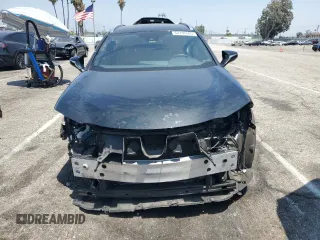 2020 Lexus UX 250h with VIN JTHX9JBH2L2034610, listed as a Copart auction lot 62195585 with 24,992 mi miles and Salvage title. Bid and sale history available at DreamBid. Image 5.