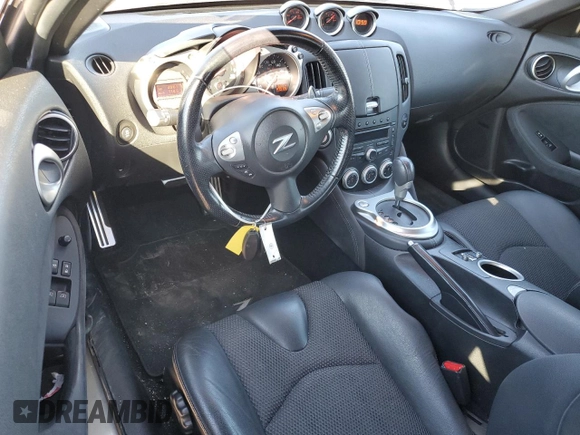 2014 Nissan 370Z Touring with VIN JN1AZ4FH3EM620195, listed as a Copart auction lot 83207104 with 66,974 mi miles and Salvage Title. Bid and sale history available at DreamBid. Image 8.