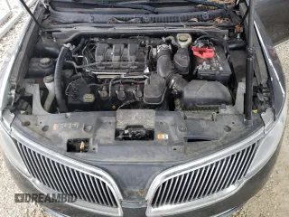 2016 Lincoln MKS z VIN 1LNHL9DK9GG601740, wystawiony jako Copart lot #60557565 z przebiegiem 89 350 mil mil oraz Szkoda całkowita • Salvage title. Historia ofert i sprzedaży dostępna na DreamBid. Obrazek 11.