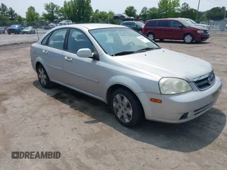 2006 Suzuki Forenza z VIN KL5JD56Z06K402504, wystawiony jako IAAI lot #42403080 z przebiegiem 118 727 mil mil oraz . Historia ofert i sprzedaży dostępna na DreamBid. Obrazek 1.