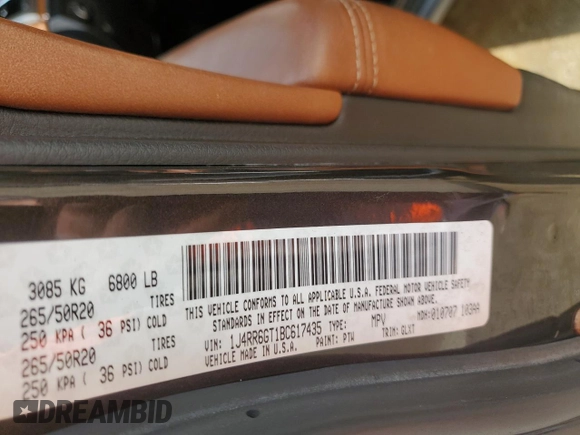 2011 Jeep Grand Cherokee Overland Summit with VIN 1J4RR6GT1BC617435, listed as a Copart auction lot 47730105 with 203,408 mi miles and Salvage Title. Bid and sale history available at carsss.com. Image 14.