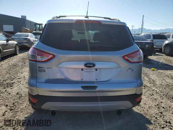 2013 Ford Escape SE z VIN 1FMCU9G96DUD12621, wystawiony jako Copart lot #56176175 z przebiegiem 85 597 mil mil oraz Szkoda całkowita • Salvage title. Historia ofert i sprzedaży dostępna na DreamBid. Obrazek 6.