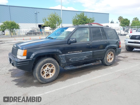 1996 Jeep Grand Cherokee Limited z VIN 1J4GZ78Y3TC191000, wystawiony jako IAAI lot #42259621 z przebiegiem 212 690 mil mil oraz . Historia ofert i sprzedaży dostępna na DreamBid. Obrazek 17.