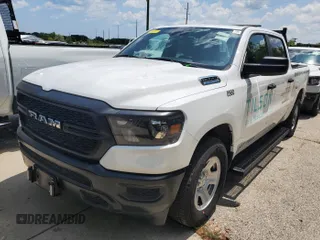 2023 Ram 1500 Tradesman with VIN 1C6RRFGG7PN620433, listed as a IAAI auction lot 42796101 with 48 mi miles and . Bid and sale history available at DreamBid. Image 14.