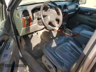2003 GMC Envoy SLE with VIN 1GKDS13S332390989, listed as a Copart auction lot 74729104 with 127,680 mi miles and Salvage Title. Bid and sale history available at carsss.com. Image 8.