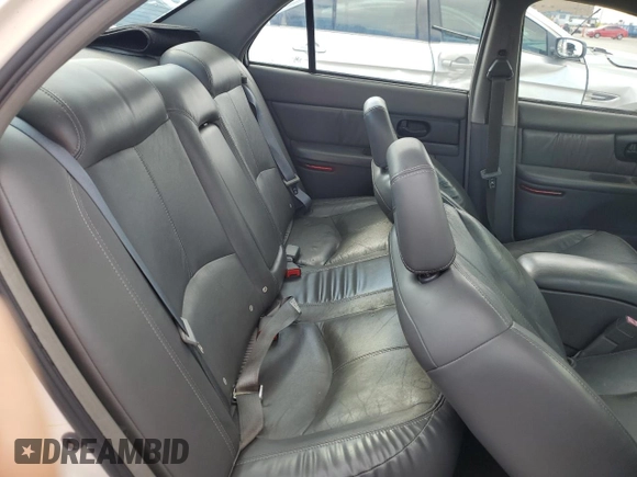 2003 Buick Regal LS z VIN 2G4WB52K731204296, wystawiony jako Copart lot #87827095 z przebiegiem 193 659 mil mil oraz Szkoda całkowita • Salvage title. Historia ofert i sprzedaży dostępna na DreamBid. Obrazek 10.