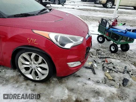 2012 Hyundai Veloster w/Red Int z VIN KMHTC6AD4CU077956, wystawiony jako Copart lot #43504505 z przebiegiem 103 183 mil mil oraz Szkoda całkowita • Salvage title. Historia ofert i sprzedaży dostępna na DreamBid. Obrazek 11.