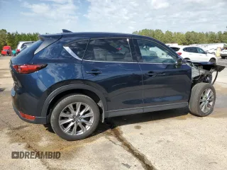 2021 Mazda CX-5 Grand Touring with VIN JM3KFBDM8M0489180, listed as a Copart auction lot 49900525 with 34,687 mi miles and Salvage Title. Bid and sale history available at carsss.com. Image 3.