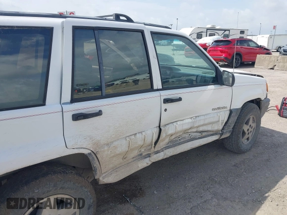 1994 Jeep Grand Cherokee Laredo with VIN 1J4FX58SXRC120936, listed as a IAAI auction lot 42530212 with 126,367 mi miles and . Bid and sale history available at DreamBid. Image 6.