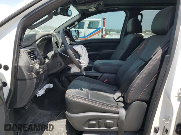 2021 Nissan Titan Pro-4X z VIN 1N6AA1ED0MN533801, wystawiony jako Copart lot #53301215 z przebiegiem 41 991 mil mil oraz Szkoda całkowita • Salvage title. Historia ofert i sprzedaży dostępna na DreamBid. Obrazek 7.