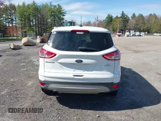 2013 Ford Escape SE with VIN 1FMCU0GXXDUA73875, listed as a IAAI auction lot 42164115 with 195,712 mi miles and . Bid and sale history available at carsss.com. Image 16.