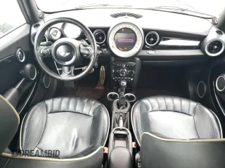 2013 MINI Convertible S с VIN WMWZP3C58DT550592, выставлен на аукционе Copart как лот 56250685 с пробегом 141 821 миль миль и Списание • Salvage title. История ставок и продаж доступна на DreamBid. Изображение 8.