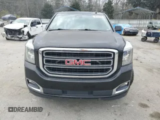 2015 GMC Yukon SLT with VIN 1GKS1BKC1FR615562, listed as a Copart auction lot 46374135 with 141,207 mi miles and Salvage Title. Bid and sale history available at carsss.com. Image 5.