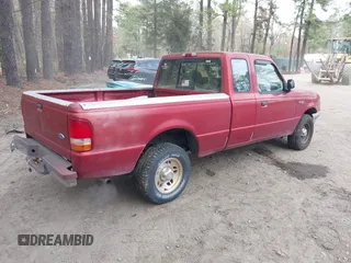 1997 Ford Ranger XLT with VIN 1FTCR14XXVPA53318, listed as a IAAI auction lot 41944173 with 246,056 mi miles. Bid and sale history available at carsss.com. Image 4.