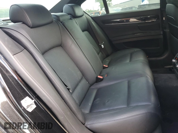 2015 BMW 7 Series 740i z VIN WBAYA6C59FD826788, wystawiony jako Copart lot #55747215 z przebiegiem 134 960 mil mil oraz Szkoda całkowita • Salvage title. Historia ofert i sprzedaży dostępna na DreamBid. Obrazek 10.